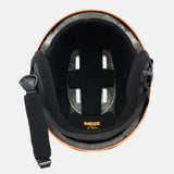 An overhead view of a helmet interior showing a black foam liner, adjustable black chin strap with plastic buckle, and a thin orange outer rim . The brand name 'RAIDER' is printed in gold on the inner liner.