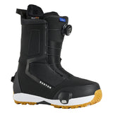 Black snowboard boot with brown sole on a white background