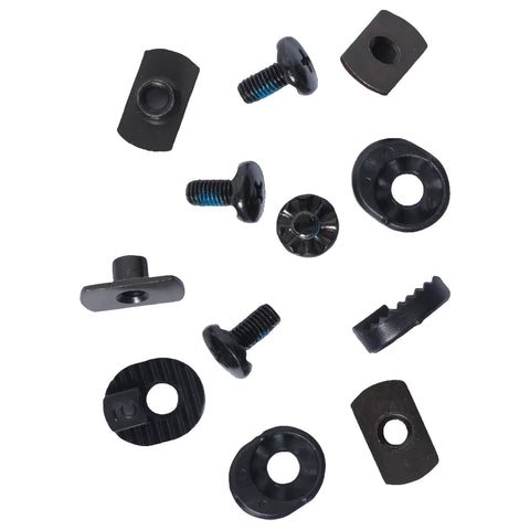 Set of black metal screws and washers on a white background