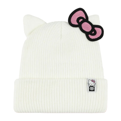 An off-white ribbed knit beanie hat featuring cat ears on top and a pink bow patch with black trim on the side, shown against a solid white background.