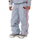 A person wearing a light blue Hello Kitty snow pants with a repeating Hello Kitty bow pattern, red piping, and red bow accents