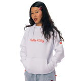 A model wearing a white Hello Kitty zip-up hoodie with red embroidered text on the chest.