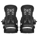 A pair of black snowboard bindings shown from the back on a light gray background, with the brand name 'UNION' printed in white on the straps.