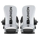 A pair of white and black snowboard bindings shown from the back on a white background, with the brand name 'UNION' printed vertically in black.