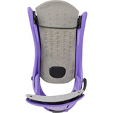A snowboard binding shown from the back, featuring a purple plastic frame and a textured gray metal plate with engraved size markings and a black release insert.