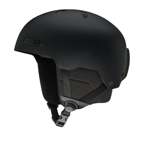 A matte black ski helmet with a dark gray interior padding and adjustable chin strap, shown from a three-quarters angle on a solid white background.